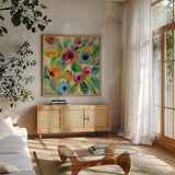 Vivid Coral Floral II by Silvia Vassileva. Shown in a natural wood frame in a cozy modern living room. Available as an archival giclee rolled canvas, fine art paper, or poster print. SKU 52205a.