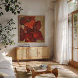 Vivid Red Gladiola on Gold Crop by Silvia Vassileva. Shown in a natural wood frame in a cozy modern living room. Available as an archival giclee rolled canvas, fine art paper, or poster print. SKU 15039a.