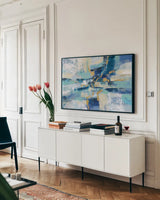 Wave Breaker by Silvia Vassileva. shown as a framed stretched canvas in a living room above a console. Available as a archival giclee rolled canvas, fine art paper, or poster print. SKU 67011i.