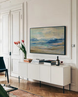Whispering Wave by Silvia Vassileva. shown as a framed stretched canvas in a living room above a console. Available as a archival giclee rolled canvas, fine art paper, or poster print. SKU 42187i.