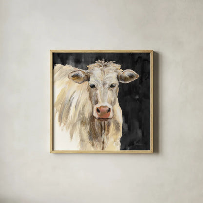 White Cow on Black by Silvia Vassileva. Shown in a natural wood glass frame for a timeless modern aesthetic. Available as an archival giclee rolled canvas, fine art paper, or poster print. SKU 70337a.