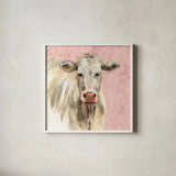 White Cow on Pink by Silvia Vassileva. Shown in a crisp white glass frame for a clean and minimalist style. Available as an archival giclee rolled canvas, fine art paper, or poster print. SKU 69171a.