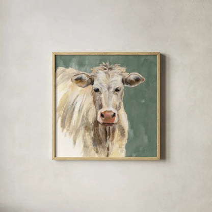 White Cow on Sage by Silvia Vassileva. Shown in a natural wood glass frame for a timeless modern aesthetic. Available as an archival giclee rolled canvas, fine art paper, or poster print. SKU 70336a.