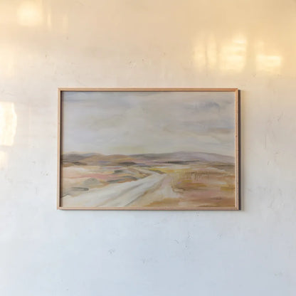 White Desert Road by Silvia Vassileva. shown as a paper print in a natural frame. Available as a archival giclee rolled canvas, fine art paper, or poster print. SKU 89309i.