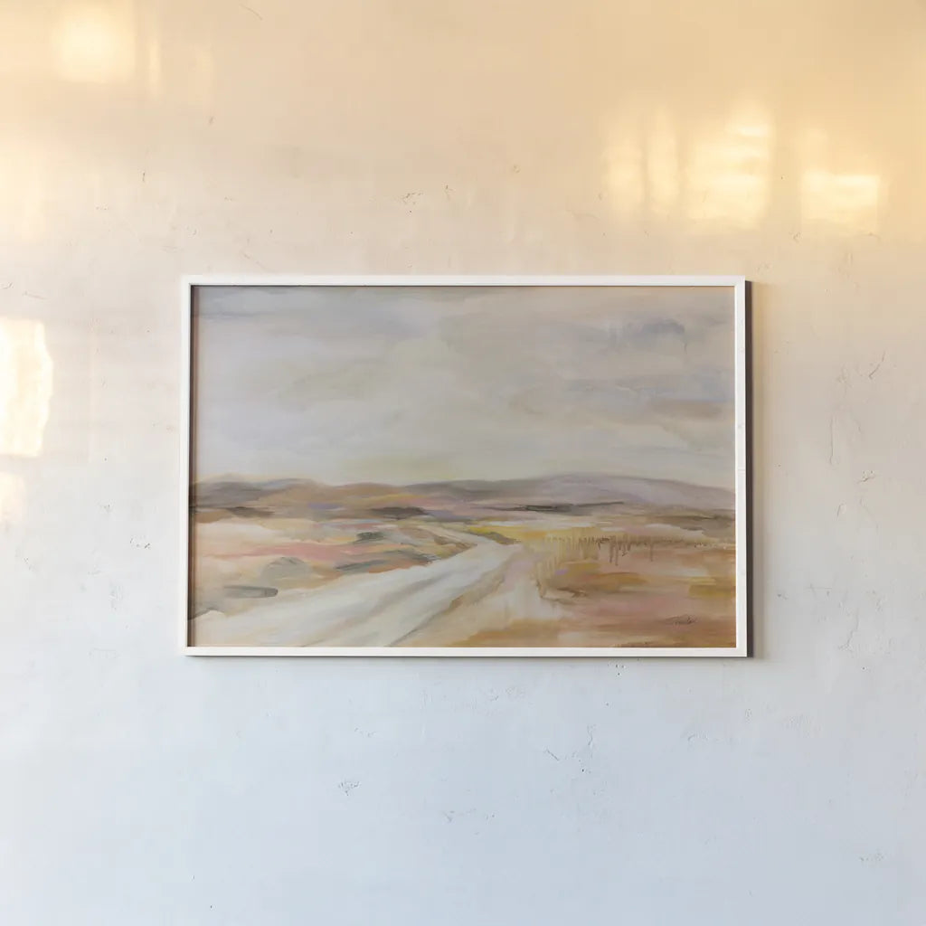 White Desert Road by Silvia Vassileva. shown as a paper print in a white frame. Available as a archival giclee rolled canvas, fine art paper, or poster print. SKU 89309i.