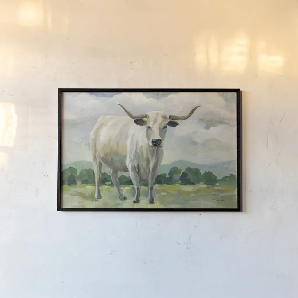 White Longhorn Cow by Silvia Vassileva. shown as a paper print in a black flame. Available as a archival giclee rolled canvas, fine art paper, or poster print. SKU 84273i.