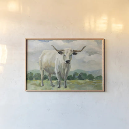 White Longhorn Cow by Silvia Vassileva. shown as a paper print in a natural frame. Available as a archival giclee rolled canvas, fine art paper, or poster print. SKU 84273i.