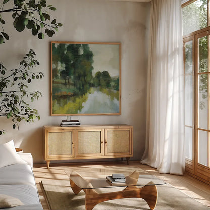 Willows by the Pond I by Silvia Vassileva. Shown in a natural wood frame in a cozy modern living room. Available as an archival giclee rolled canvas, fine art paper, or poster print. SKU 88693a.