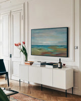 Wispy Clouds by Silvia Vassileva. shown as a framed stretched canvas in a living room above a console. Available as a archival giclee rolled canvas, fine art paper, or poster print. SKU 13293i.