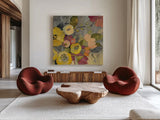 Yellow Floral Duo I Crop by Silvia Vassileva. Shown as extra-large giant wall art in a modern living room. Available as an archival giclee rolled canvas, fine art paper, or poster print. SKU 21583a.