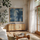 Batik Seas I by Studio Mousseau. Shown in a natural wood frame in a cozy modern living room. Available as an archival giclee rolled canvas, fine art paper, or poster print. SKU 32501a.