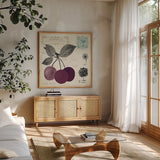 Cherry Notes by Studio Mousseau. Shown in a natural wood frame in a cozy modern living room. Available as an archival giclee rolled canvas, fine art paper, or poster print. SKU 10741a.