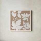 Leaves of Inspiration I Neutral by Studio Mousseau. Shown in a crisp white glass frame for a clean and minimalist style. Available as an archival giclee rolled canvas, fine art paper, or poster print. SKU 77401a.