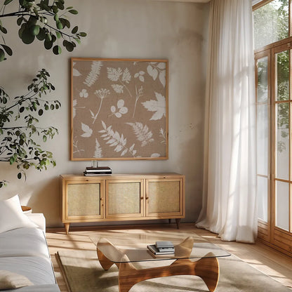Leaves of Inspiration Neutral Pattern I by Studio Mousseau. Shown in a natural wood frame in a cozy modern living room. Available as an archival giclee rolled canvas, fine art paper, or poster print. SKU 77405a.