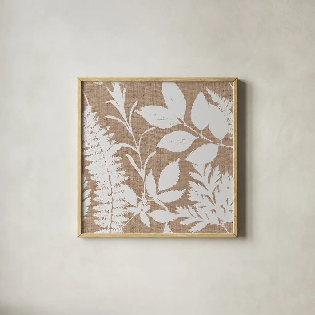Leaves of Inspiration Neutral Pattern II by Studio Mousseau. Shown in a natural wood glass frame for a timeless modern aesthetic. Available as an archival giclee rolled canvas, fine art paper, or poster print. SKU 77410a.