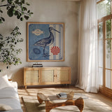Sea Bird III by Studio Mousseau. Shown in a natural wood frame in a cozy modern living room. Available as an archival giclee rolled canvas, fine art paper, or poster print. SKU 24705a.