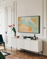 Abstract Sunrise by Sue Schlabach. shown as a framed stretched canvas in a living room above a console. Available as a archival giclee rolled canvas, fine art paper, or poster print. SKU 67145i.