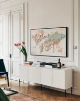Across the World v2 by Sue Schlabach. shown as a framed stretched canvas in a living room above a console. Available as a archival giclee rolled canvas, fine art paper, or poster print. SKU 38255i.