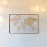 Across the World v5 Champagne by Sue Schlabach. shown as a paper print in a natural frame. Available as a archival giclee rolled canvas, fine art paper, or poster print. SKU 43002i.