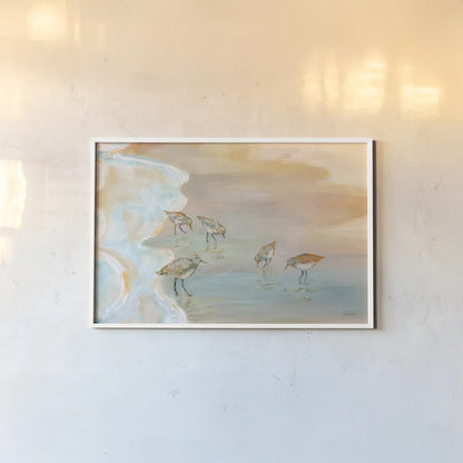 Back Bay Sandpipers by Sue Schlabach. shown as a paper print in a white frame. Available as a archival giclee rolled canvas, fine art paper, or poster print. SKU 85241i.