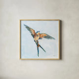Barn Swallow Flight I by Sue Schlabach. Shown in a natural wood glass frame for a timeless modern aesthetic. Available as an archival giclee rolled canvas, fine art paper, or poster print. SKU 84227a.