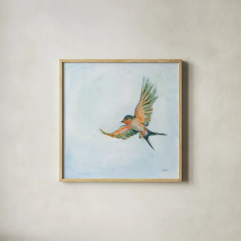 Barn Swallow Flight III by Sue Schlabach. Shown in a natural wood glass frame for a timeless modern aesthetic. Available as an archival giclee rolled canvas, fine art paper, or poster print. SKU 84229a.