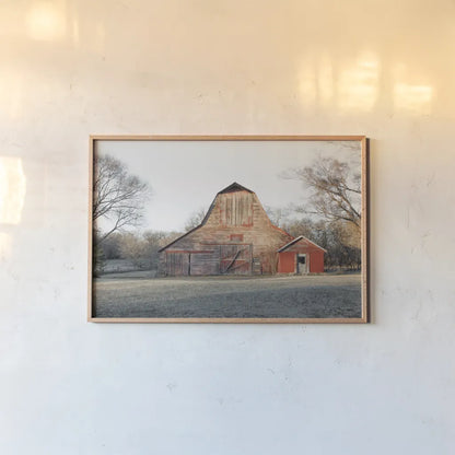 Barn in the Heartland by Sue Schlabach. shown as a paper print in a natural frame. Available as a archival giclee rolled canvas, fine art paper, or poster print. SKU 82861i.