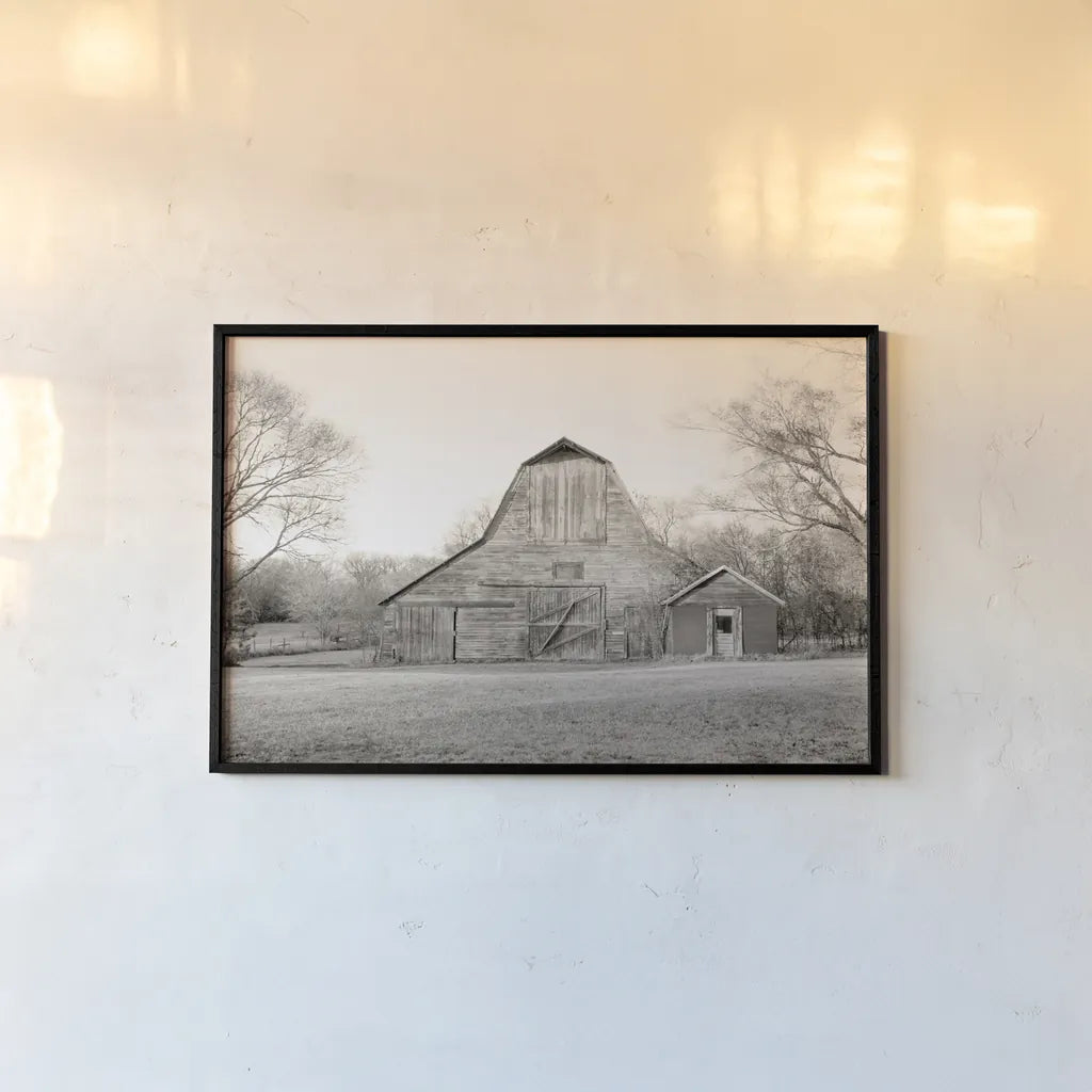 Barn in the Heartland BW by Sue Schlabach. shown as a paper print in a black flame. Available as a archival giclee rolled canvas, fine art paper, or poster print. SKU 82862i.