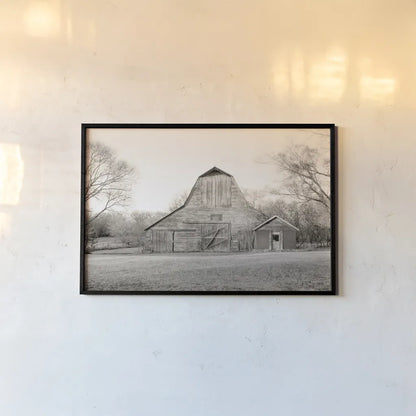 Barn in the Heartland BW by Sue Schlabach. shown as a paper print in a black flame. Available as a archival giclee rolled canvas, fine art paper, or poster print. SKU 82862i.