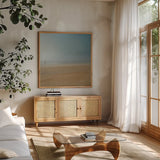 Beach Stroll no Border by Sue Schlabach. Shown in a natural wood frame in a cozy modern living room. Available as an archival giclee rolled canvas, fine art paper, or poster print. SKU 10606a.