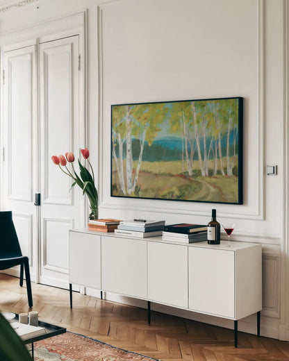 Birch Road by Sue Schlabach. shown as a framed stretched canvas in a living room above a console. Available as a archival giclee rolled canvas, fine art paper, or poster print. SKU 68634i.