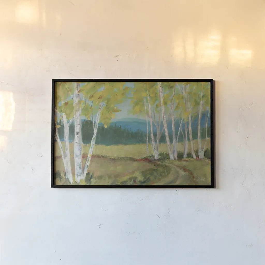 Birch Road by Sue Schlabach. shown as a paper print in a black flame. Available as a archival giclee rolled canvas, fine art paper, or poster print. SKU 68634i.