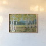 Birch Road by Sue Schlabach. shown as a paper print in a natural frame. Available as a archival giclee rolled canvas, fine art paper, or poster print. SKU 68634i.