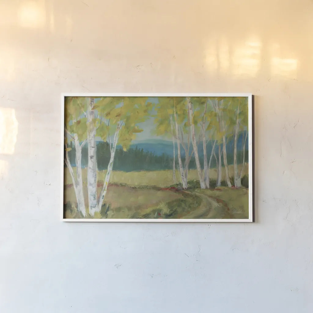 Birch Road by Sue Schlabach. shown as a paper print in a white frame. Available as a archival giclee rolled canvas, fine art paper, or poster print. SKU 68634i.