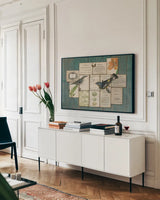 Birds of the Garden by Sue Schlabach. shown as a framed stretched canvas in a living room above a console. Available as a archival giclee rolled canvas, fine art paper, or poster print. SKU 2802i.
