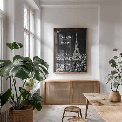 Black Blueprint Map Eiffel Tower by Sue Schlabach. shown as a print in a natural wood frame in a dining room. Available as a archival giclee rolled canvas, fine art paper, or poster print. SKU 36395h.