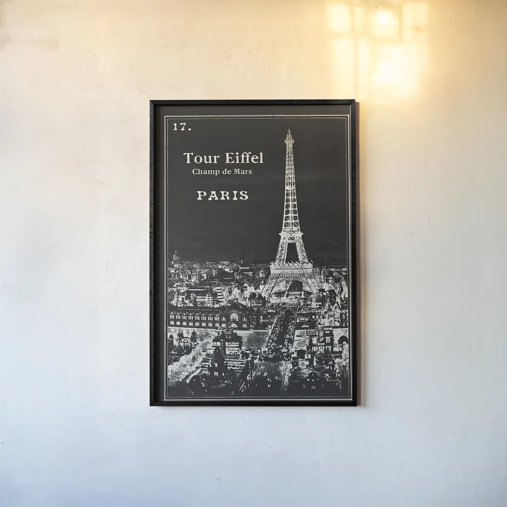 Black Blueprint Map Eiffel Tower by Sue Schlabach. shown as a paper print in a black flame. Available as a archival giclee rolled canvas, fine art paper, or poster print. SKU 36395h.