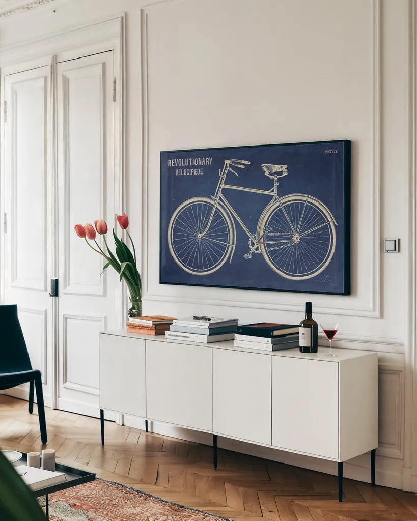 Blueprint Bicycle by Sue Schlabach. shown as a framed stretched canvas in a living room above a console. Available as a archival giclee rolled canvas, fine art paper, or poster print. SKU 47418i.