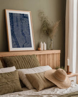 Blueprint Map New York by Sue Schlabach. shown as a paper print in a natural frame. Available as a archival giclee rolled canvas, fine art paper, or poster print. SKU 12157h.