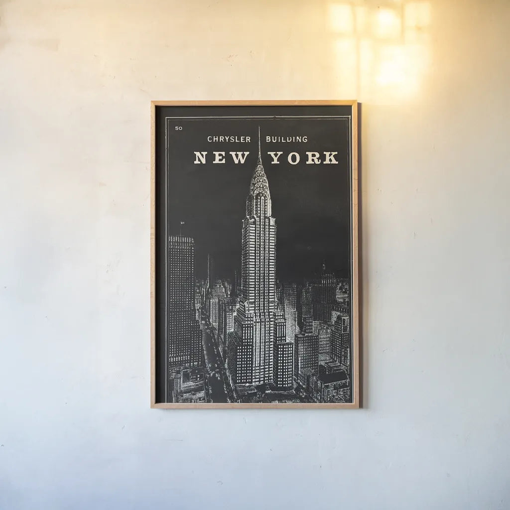 Blueprint Map New York Chrysler Building Black by Sue Schlabach. shown as a paper print in a natural frame. Available as a archival giclee rolled canvas, fine art paper, or poster print. SKU 22805h.