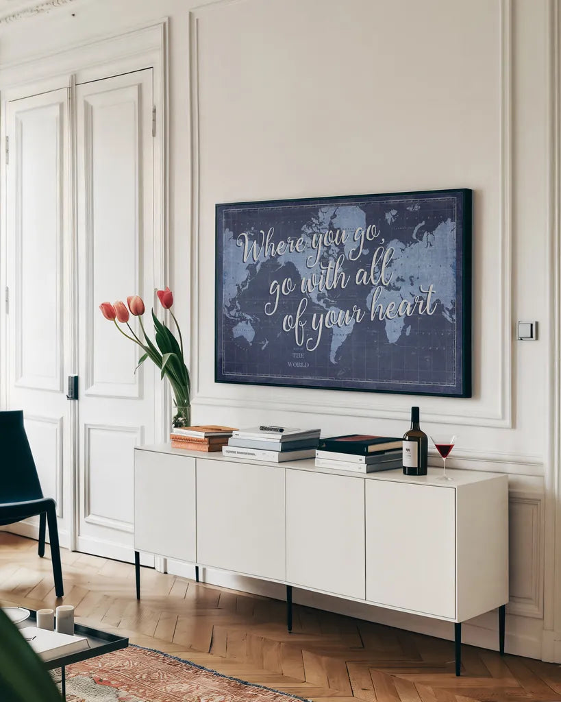 Blueprint World Map Heart by Sue Schlabach. shown as a framed stretched canvas in a living room above a console. Available as a archival giclee rolled canvas, fine art paper, or poster print. SKU 51897i.