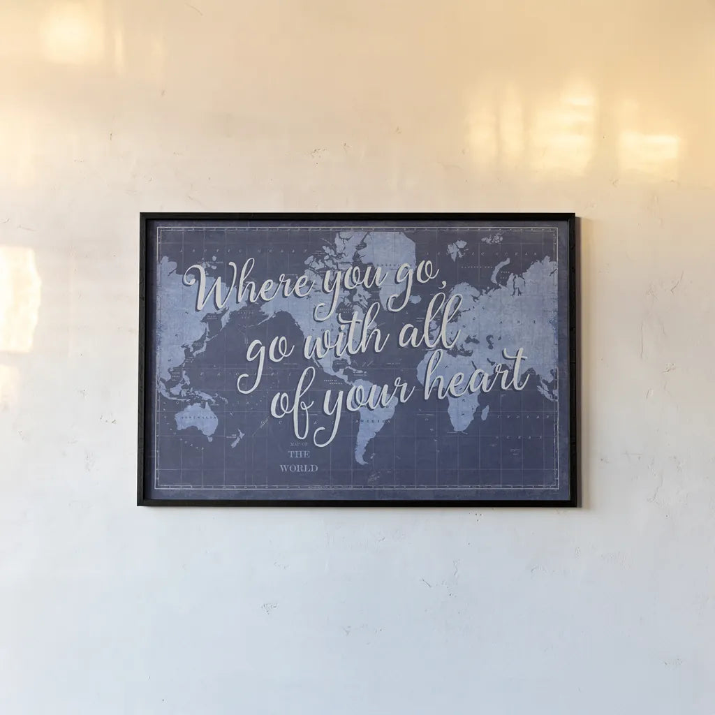 Blueprint World Map Heart by Sue Schlabach. shown as a paper print in a black flame. Available as a archival giclee rolled canvas, fine art paper, or poster print. SKU 51897i.