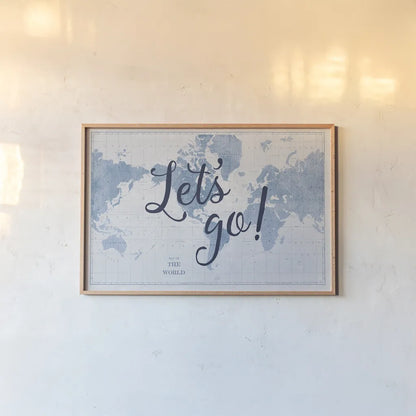 Blueprint World Map Lets Go by Sue Schlabach. shown as a paper print in a natural frame. Available as a archival giclee rolled canvas, fine art paper, or poster print. SKU 75013i.