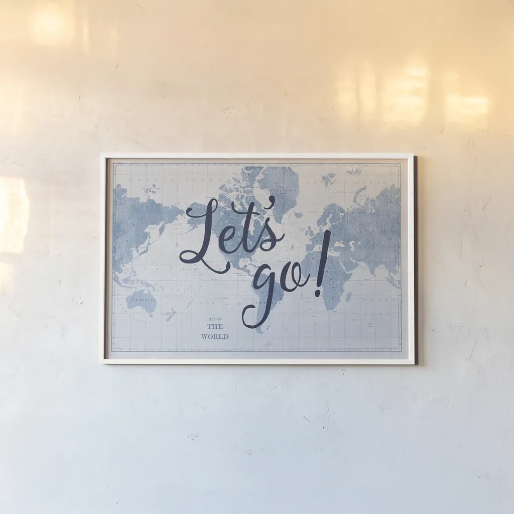 Blueprint World Map Lets Go by Sue Schlabach. shown as a paper print in a white frame. Available as a archival giclee rolled canvas, fine art paper, or poster print. SKU 75013i.