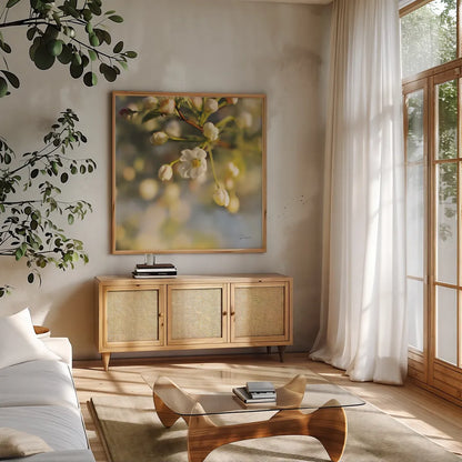 Blush Blossoms II Square by Sue Schlabach. Shown in a natural wood frame in a cozy modern living room. Available as an archival giclee rolled canvas, fine art paper, or poster print. SKU 22116a.