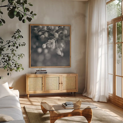 Blush Blossoms II Square BW by Sue Schlabach. Shown in a natural wood frame in a cozy modern living room. Available as an archival giclee rolled canvas, fine art paper, or poster print. SKU 22118a.