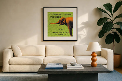 Bright Safari Elephant by Sue Schlabach. Displayed in a glass frame with matte in a clean modern living room. Available as an archival giclee rolled canvas, fine art paper, or poster print. SKU 18528a.