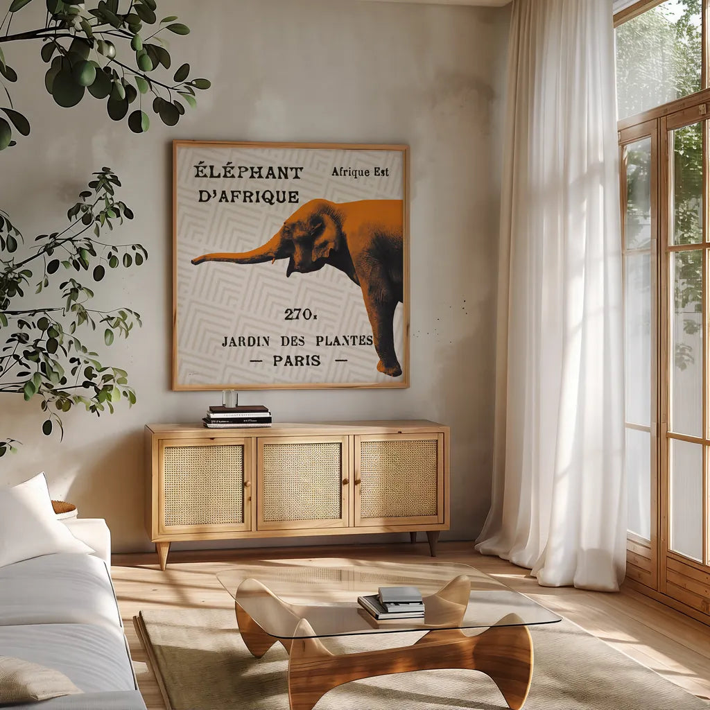 Bright Safari Elephant on Taupe by Sue Schlabach. Shown in a natural wood frame in a cozy modern living room. Available as an archival giclee rolled canvas, fine art paper, or poster print. SKU 44788a.