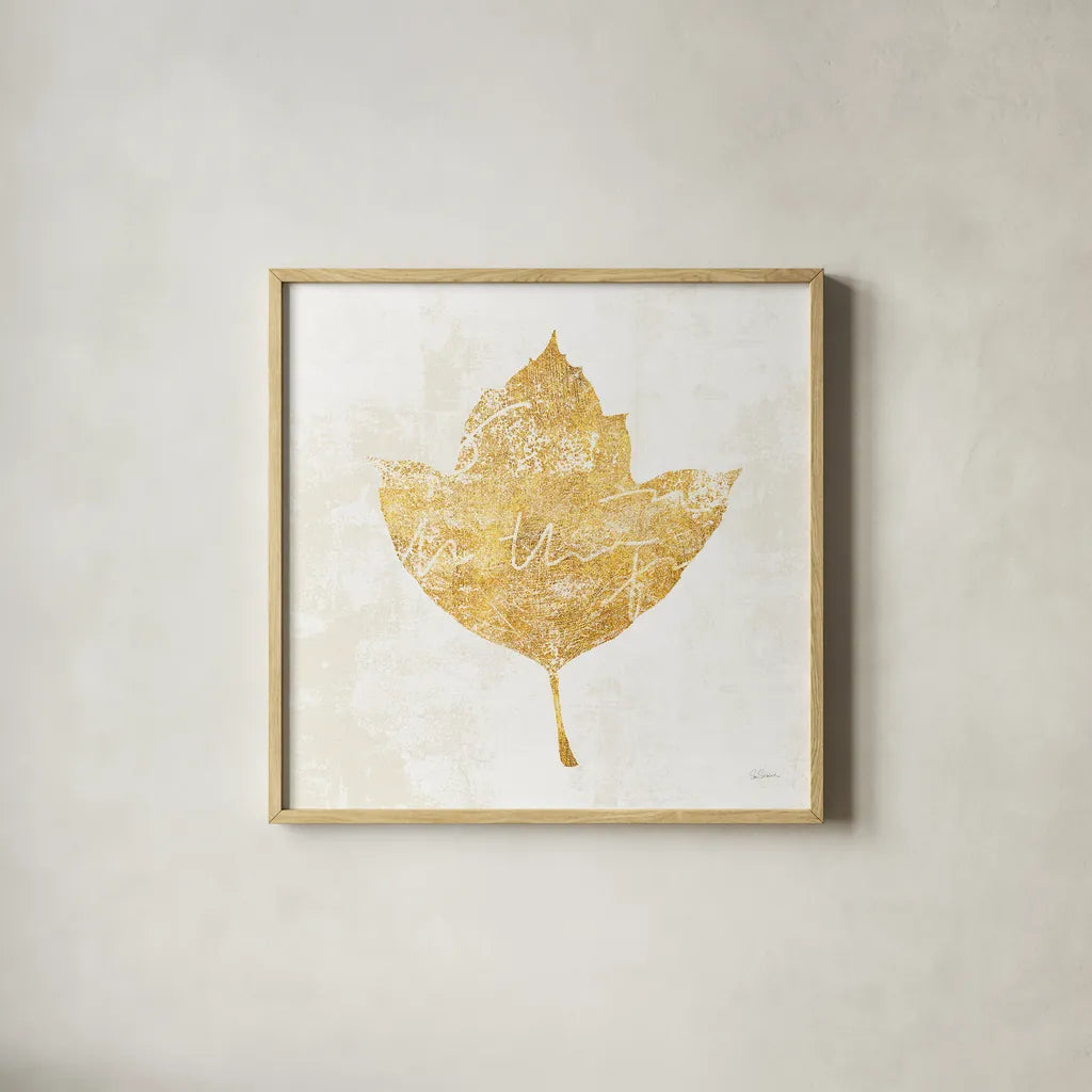 Bronzed Leaf I by Sue Schlabach. Shown in a natural wood glass frame for a timeless modern aesthetic. Available as an archival giclee rolled canvas, fine art paper, or poster print. SKU 21195a.