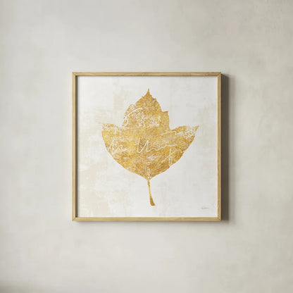 Bronzed Leaf I by Sue Schlabach. Shown in a natural wood glass frame for a timeless modern aesthetic. Available as an archival giclee rolled canvas, fine art paper, or poster print. SKU 21195a.